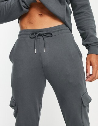 ASOS DESIGN tracksuit with hoodie \u0026 skinny cargo joggers in washed black -  ShopStyle Trousers