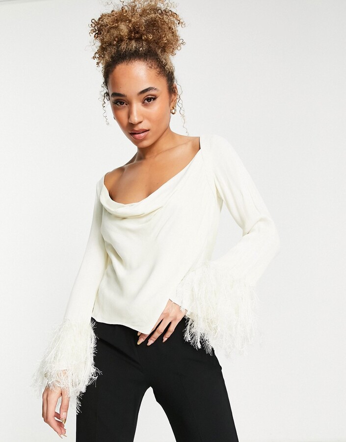 ASOS DESIGN long sleeve top with feather cuff detail in cream