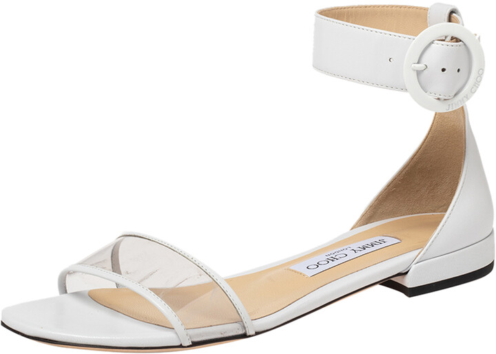 white flats with ankle strap