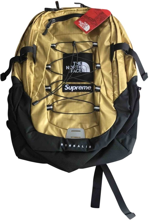 gold supreme backpack