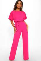 Thumbnail for your product : Pink Boutique Oh So Glam Fuchsia Batwing Belted Wide Leg Jumpsuit