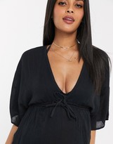 Thumbnail for your product : ASOS DESIGN MATERNITY crinkle beach cover up with channel waist & drape sleeves in black