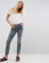Thumbnail for your product : ASOS Design Kimmi Shrunken Boyfriend Jeans In Scout Green Cast With Rip And Repair