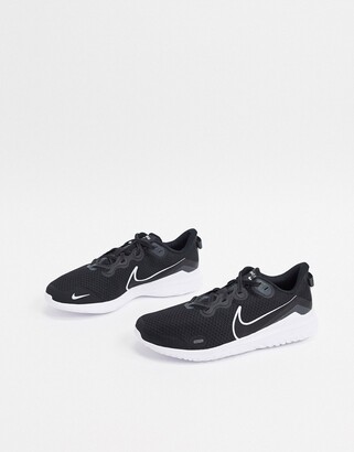 Nike Running Renew Arena 2 sneakers in black and white - ShopStyle