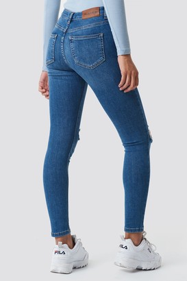 NA-KD Skinny Mid Waist Destroyed Jeans