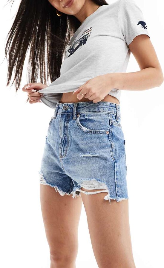 Stradivarius ripped denim short in medium blue ShopStyle