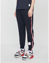 Thumbnail for your product : Thom Browne Side-stripe stretch-cotton tracksuit bottoms