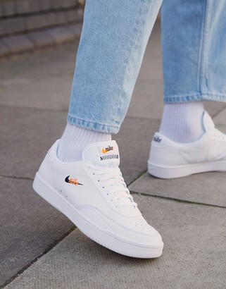 nike court vintage premium leather trainers in white