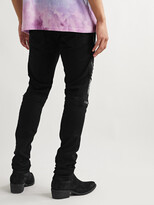 Thumbnail for your product : Amiri Mx2 Skinny-Fit Panelled Distressed Stretch-Denim Jeans