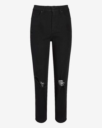 ladies black ripped knee jeans