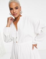 Thumbnail for your product : ASOS Curve ASOS DESIGN Curve textured long sleeve waisted mini shirt dress with tier hem in ecru