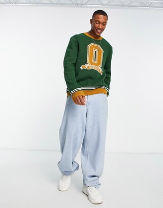 ASOS DESIGN knitted relaxed fit sweater with collegiate print in green