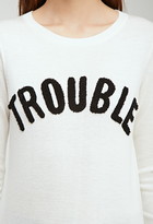 Thumbnail for your product : Forever 21 Trouble Graphic Sweater