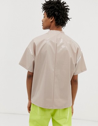 ASOS DESIGN oversized t-shirt with half sleeve and zip neck in vinyl fabric