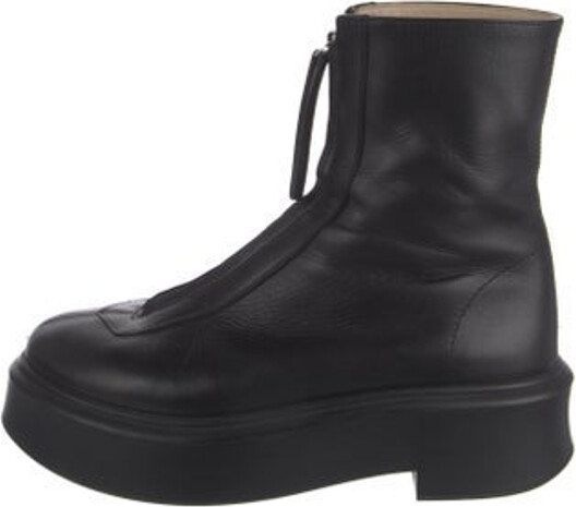 The Row Zipped I Mid-Calf Combat Boots Black Leather Square-Toes Platform Concealed Zip Closure at Uppers Includes Dust Bag Unfortunately, due to restrictions, this item may not be eligible for shipping in all areas.