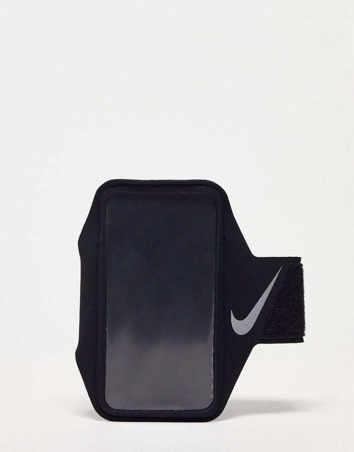 Nike Running lean phone arm band in black - ShopStyle Tops