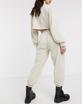 Thumbnail for your product : Bershka No Item slogan oversized jogger in beige