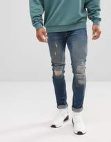 Thumbnail for your product : ASOS Extreme Super Skinny Jeans In Dark Wash Vintage With Rip And Repair
