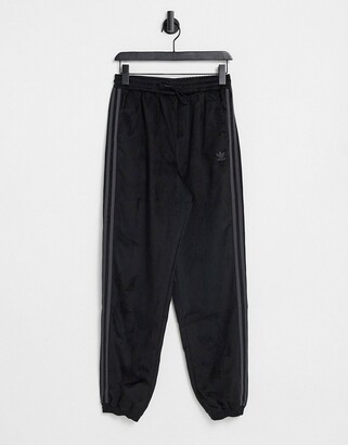 adidas 'Comfy Cords' velvet corduroy cuffed trackies in black