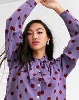Thumbnail for your product : Monki polka dot blouse with pussy bow neck in purple