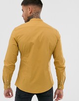 Thumbnail for your product : ASOS DESIGN stretch slim smart shirt in mustard with grandad collar