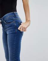 Thumbnail for your product : ASOS Petite DESIGN Petite Lisbon midrise skinny jeans in kyla wash with raw hem-Blue