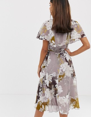 ASOS DESIGN midi dress with cape back and dipped hem in patchwork floral