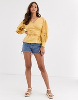Thumbnail for your product : ASOS DESIGN long sleeve top with cut out sleeve detail and belt