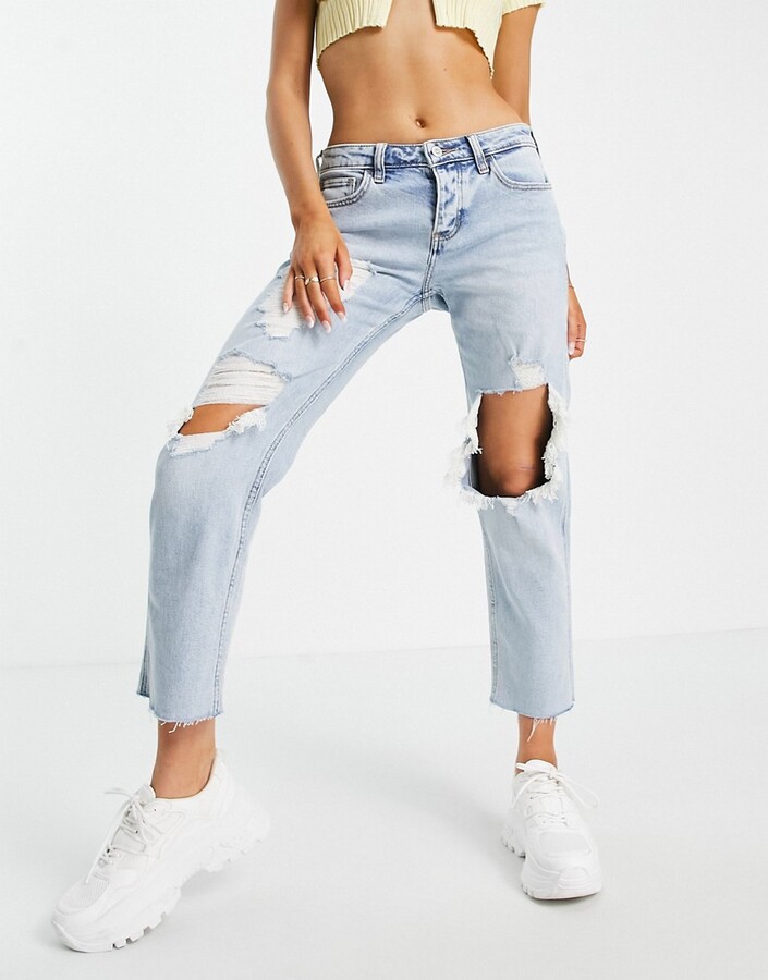 Hollister shredded boyfriend jeans in light blue wash - ShopStyle