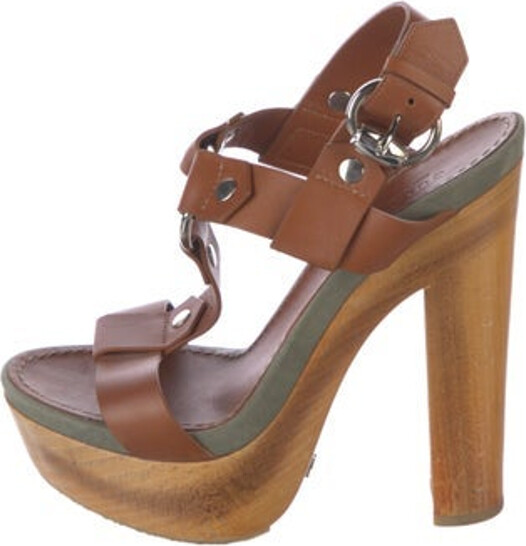 Gucci Leather T-Strap Sandals Brown & Green Studded Accents & Suede Trim Platform Straps & Buckle Closure at Ankles Unfortunately, due to restrictions, this item may not be eligible for shipping in all areas.