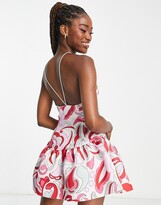 Thumbnail for your product : ASOS DESIGN high neck seamed low back pephem mini dress in oversized pink paisley