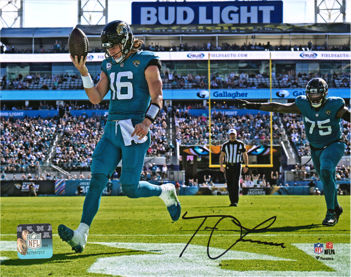 Fanatics Authentic Trevor Lawrence Jacksonville Jaguars Autographed 8'' x 10'' Teal Jersey Rush Touchdown Photograph