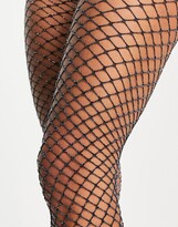 Thumbnail for your product : ASOS DESIGN metallic fishnets in sliver
