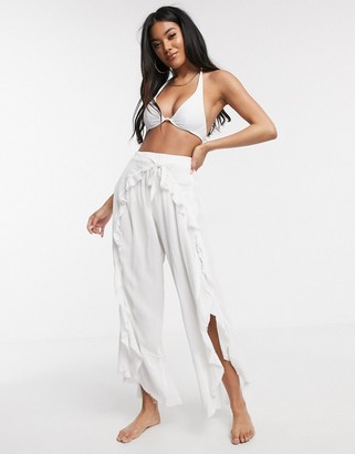 ASOS DESIGN ruffle split front beach pants with tie waist in white