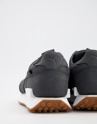Puma future rider premium sneakers in black with gum sole Clearance