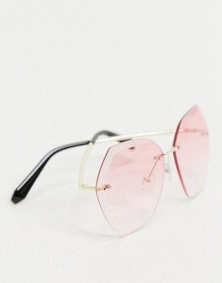 SVNX hexagon sunglasses in gold with pink lens