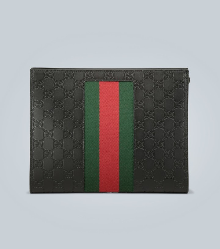 gucci supreme web pouch