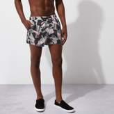 Thumbnail for your product : River Island Mens Pink shard print runner swim shorts