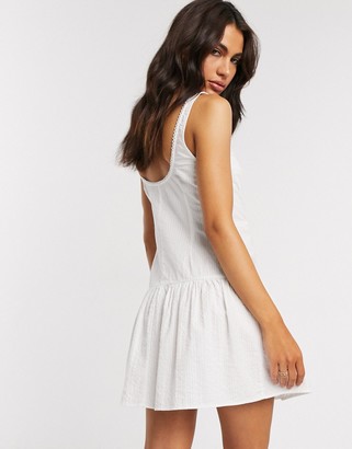 ASOS DESIGN lace up sundress with lace inserts in white