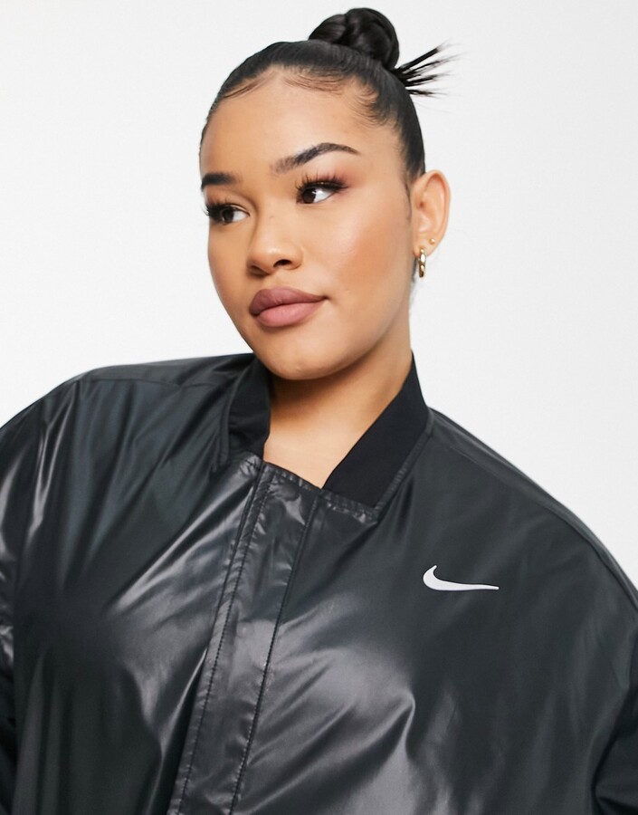 Nike Running Plus Essential swoosh jacket in wet look black ShopStyle