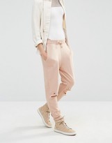 Thumbnail for your product : Missguided Tall Distressed Knee Track Pants