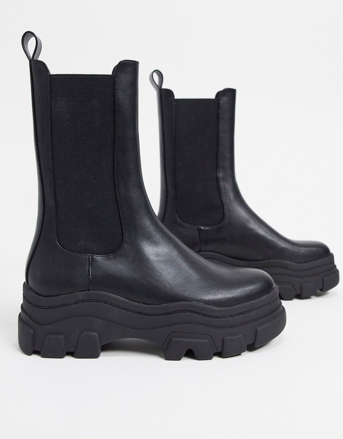 Bershka stretch ankle boot with track sole in black - ShopStyle