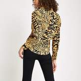 Thumbnail for your product : River Island Orange leopard print tucked waist shirt