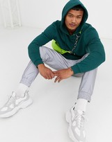 Thumbnail for your product : ASOS Design DESIGN hoodie in teal green with gold side zips