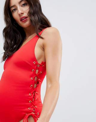 ASOS Maternity DESIGN Maternity recycled glam eyelet lace up swimsuit in red