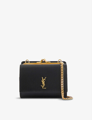 ysl black bag with gold tassel