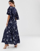 Thumbnail for your product : Liquorish midi dress with flutter sleeve in navy floral print