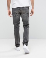 Thumbnail for your product : Diesel Tepphar Skinny Jeans 674U DNA Gray Distress Repair
