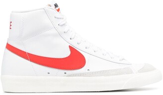red and white nike high tops