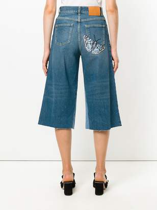 Gucci butterfly patch cropped jeans